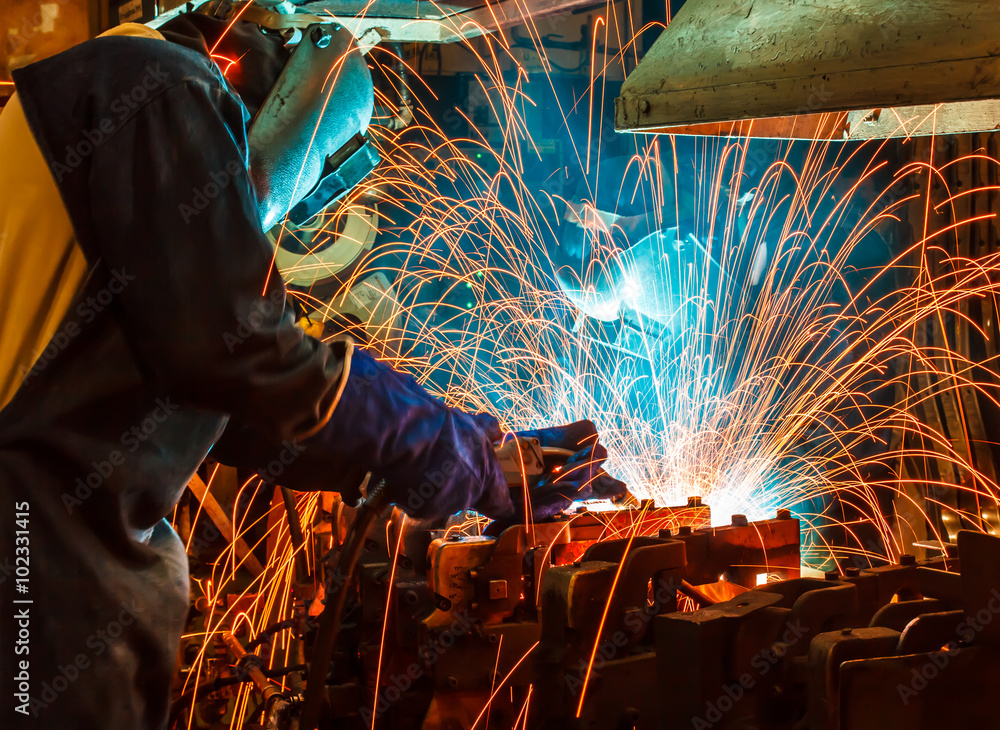 welder Industrial automotive part in factory welder Industrial automotive part in factory