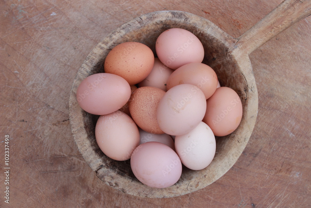 Eggs and wooden background Eggs and wooden background