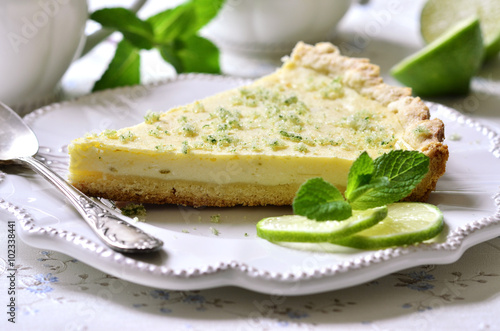 Lime cheesecake with mint sugar.