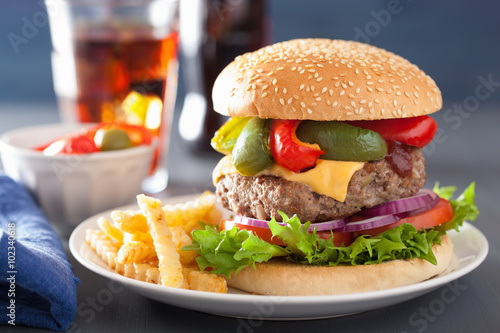 homedade cheese burger with peppers tomato onion
