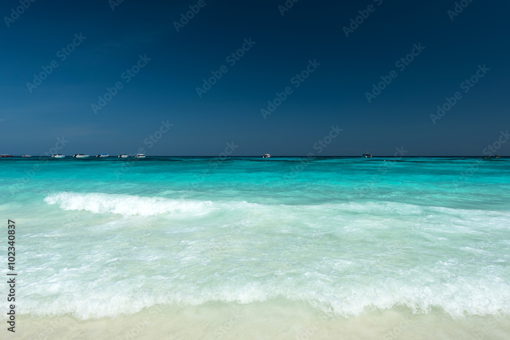 Refreshing water splash at the tropical beach , Located Ta Cai Island,Thailand Refreshing water splash at the tropical beach , Located Ta Cai Island,Thailand