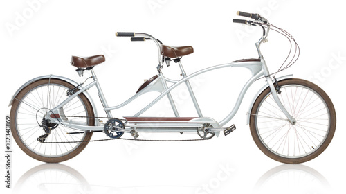 Retro styled tandem bicycle isolated on a white