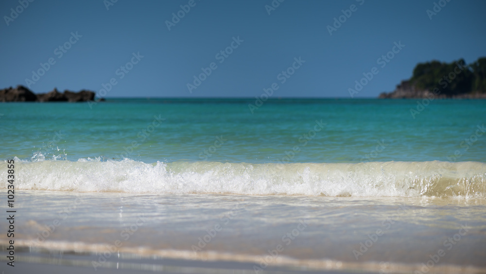 Refreshing water splash at the tropical beach , Located Surin Island,Thailand, Selective shallow depth of field