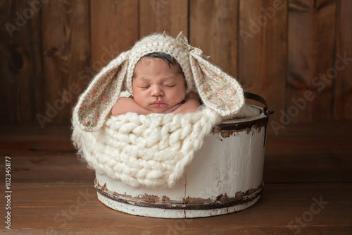 Newborn Girl Wearing a Bunny Bonnet