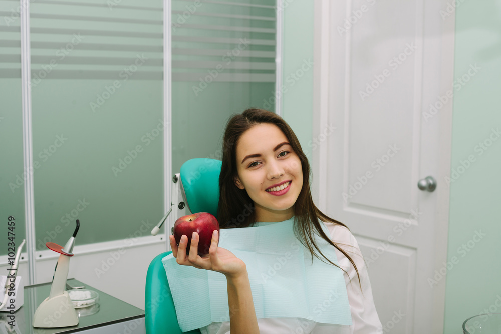 pretty young woman in a dental office.
pretty young woman in a dental office.