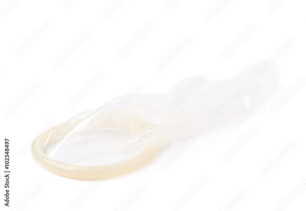 Unrolled latex condom isolated Unrolled latex condom isolated