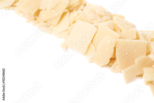 Line of parmesan cheese flakes