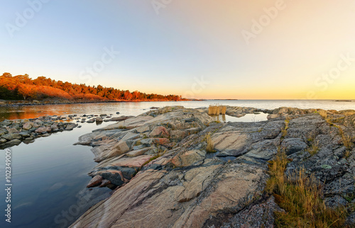 Sunrise over coast with a n...