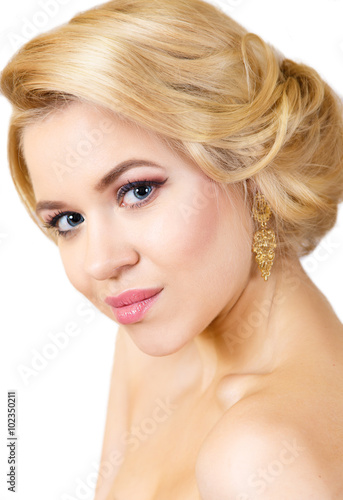 beauty portrait of a beautiful blonde with beautiful make-up isolated on white.