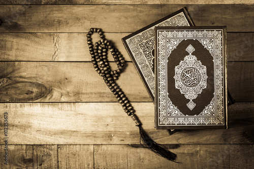 Koran - holy book of Muslims,vintage style filtered photo photo