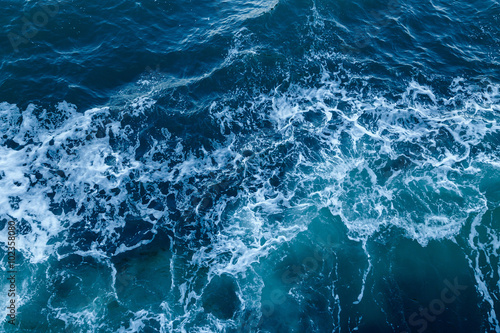 Blue sea texture with waves and foam © Ivan Kurmyshov