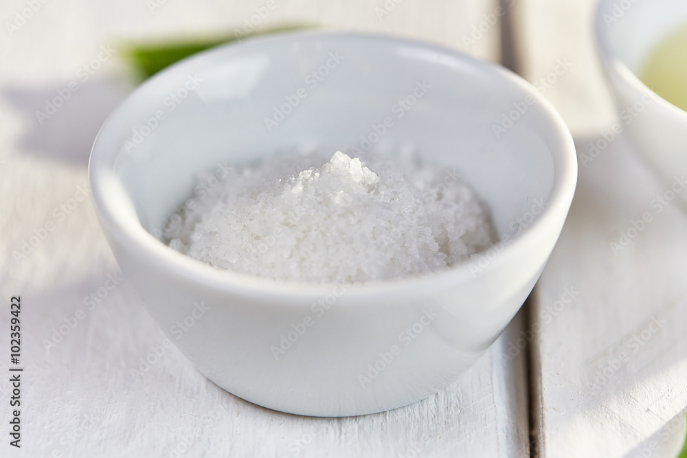 Sea salt in a white dish Sea salt in a white dish