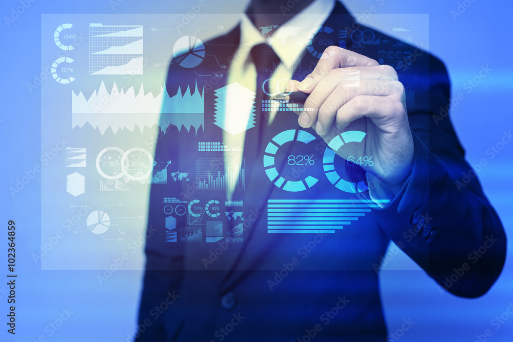 Businessman in blue suit working with digital virtual screen Businessman in blue suit working with digital virtual screen