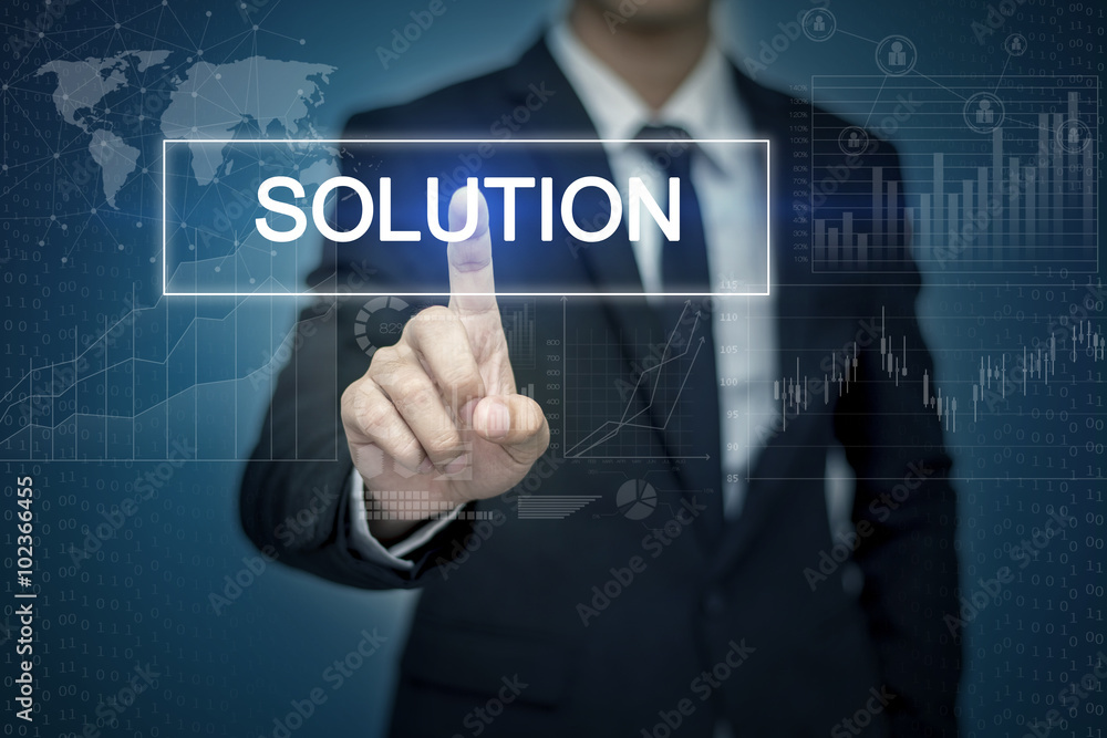 Businessman hand touching SOLUTION button on virtual screen Businessman hand touching SOLUTION button on virtual screen