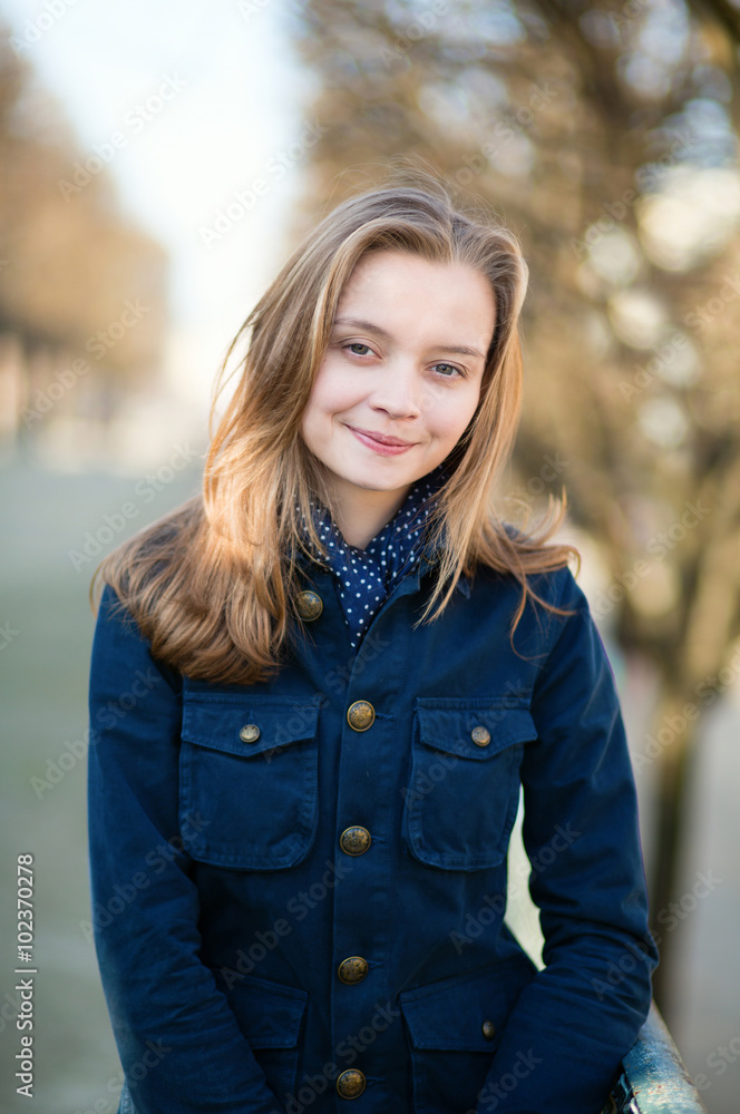 Young girl outdoors on a spring day Young girl outdoors on a spring day