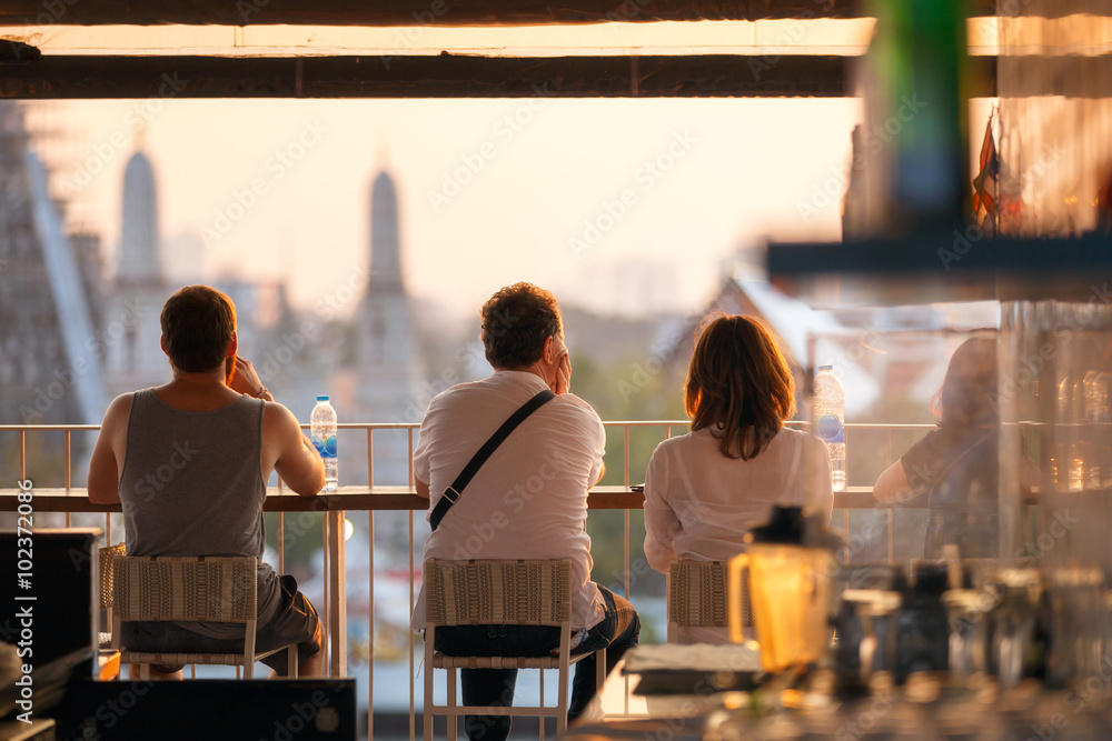 Fototapeta premium Travelers enjoying take look at view sunset time.