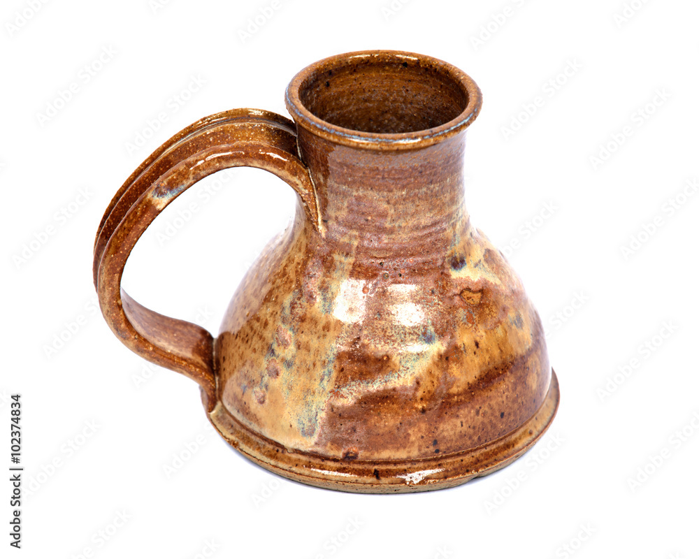 Clay jug isolated on white background