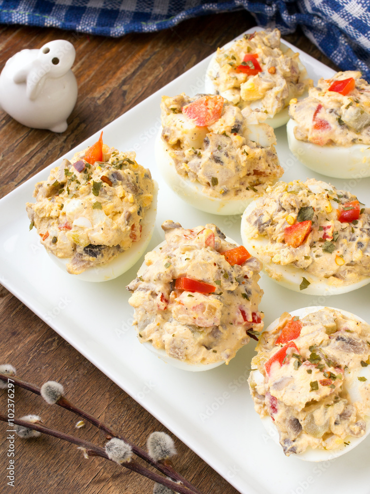 stuffed eggs with peppers, mushrooms and herbs - selective focus stuffed eggs with peppers, mushrooms and herbs - selective focus