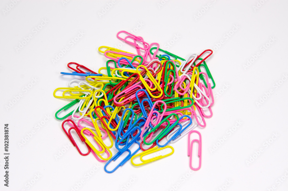Paper clips on white background. Paper clips on white background.