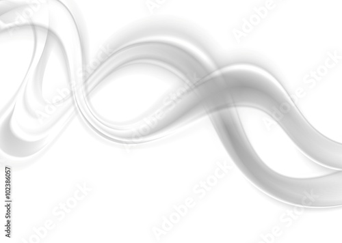 Abstract smooth blurred grey waves on white background