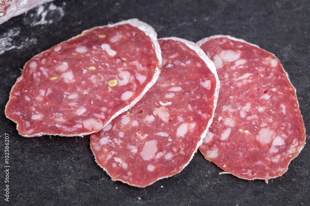 Delicious italian felino sliced salami. Delicious italian felino sliced salami.