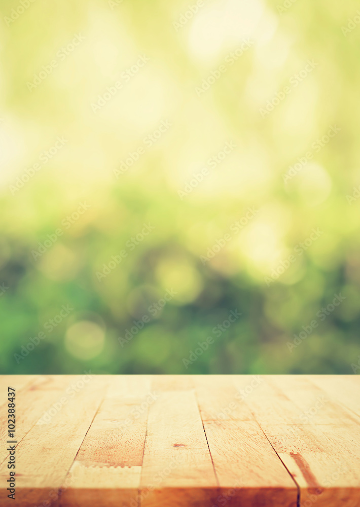 Wood table top on green bokeh abstract background, vintage tone, Wood table top on green bokeh abstract background, vintage tone,