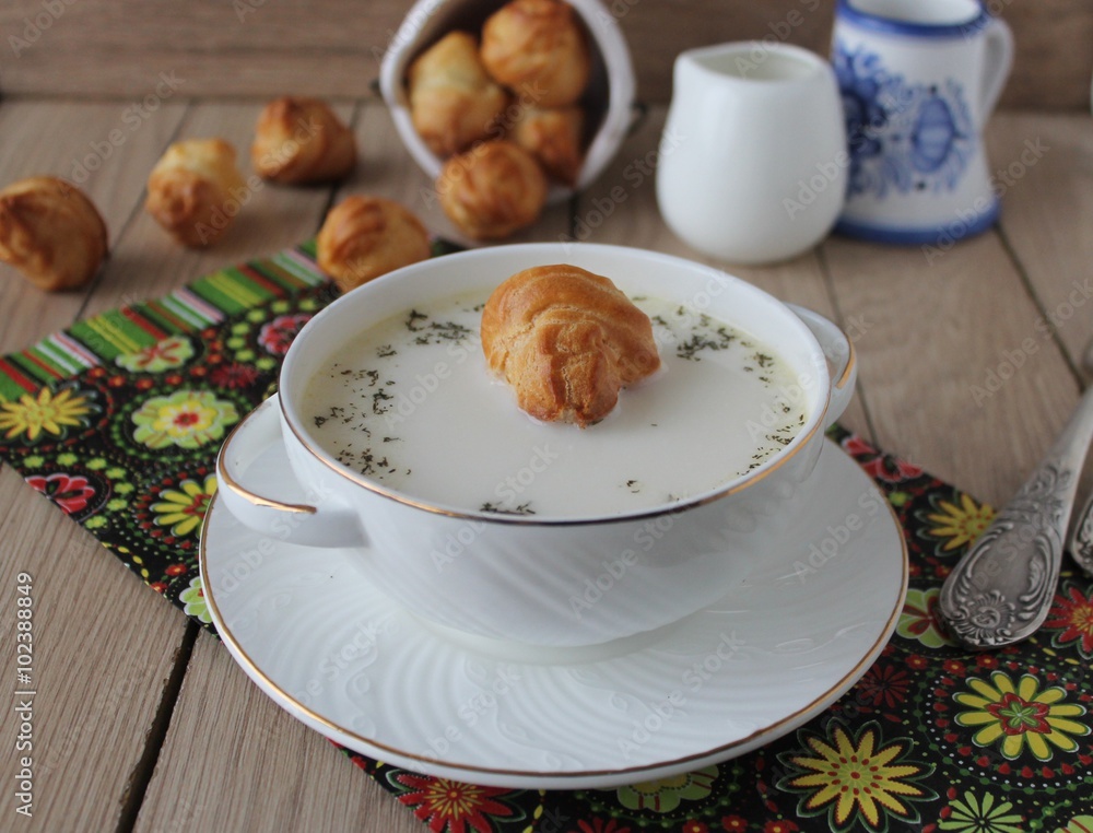 cheese soup with profiteroles