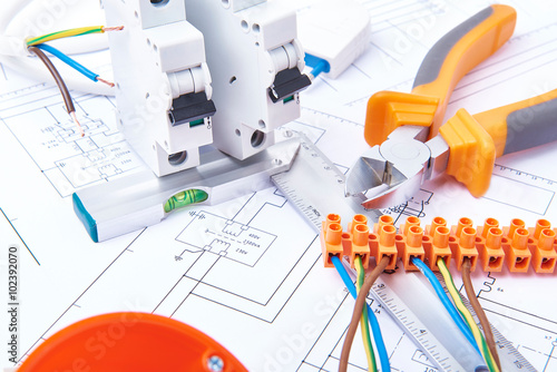 Components for use in electrical installations. Cut pliers, connectors, fuses and wires. Accessories for engineering work, energy concept.