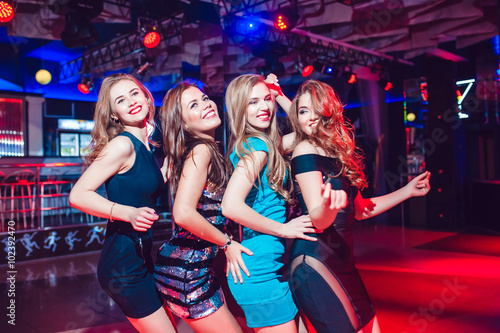 Beautiful girls having fun at a party in nightclub