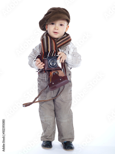 boy with aged retro camera