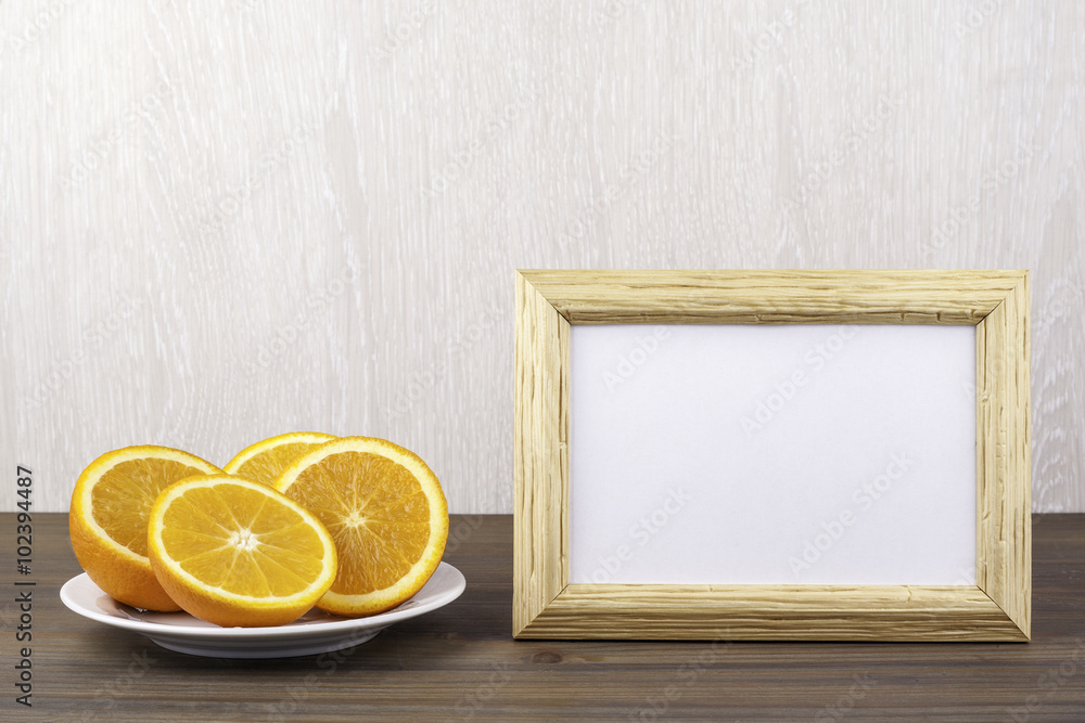 Fresh sweet oranges on the wooden table