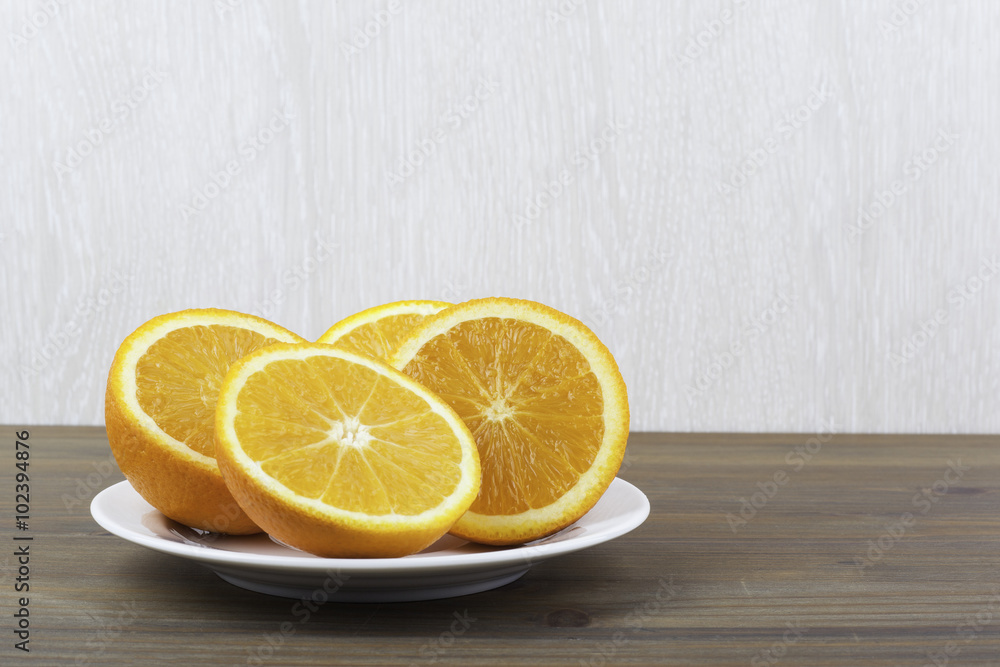 Fresh sweet oranges on the wooden table Fresh sweet oranges on the wooden table