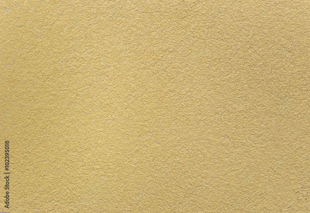 Yellow texture of plastered wall Yellow texture of plastered wall