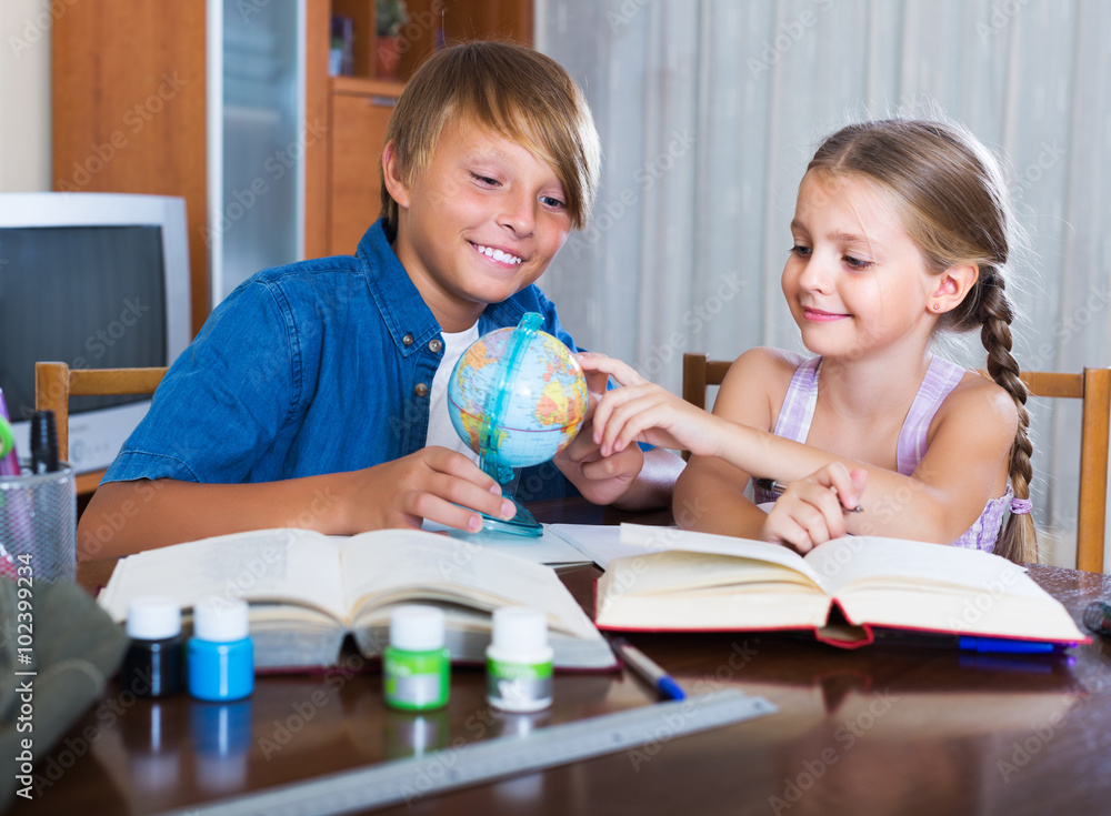 Fototapeta premium Portrait of children with textbooks