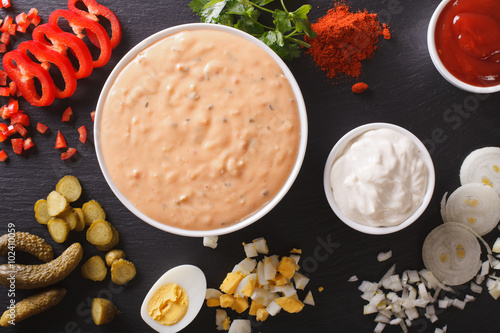 Thousand Island Dressing with ingredients close-up. horizontal top view

