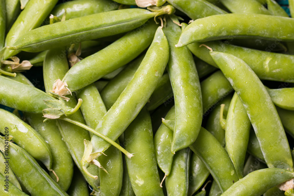 green peas on wooden table ,healthy concept green peas on wooden table ,healthy concept