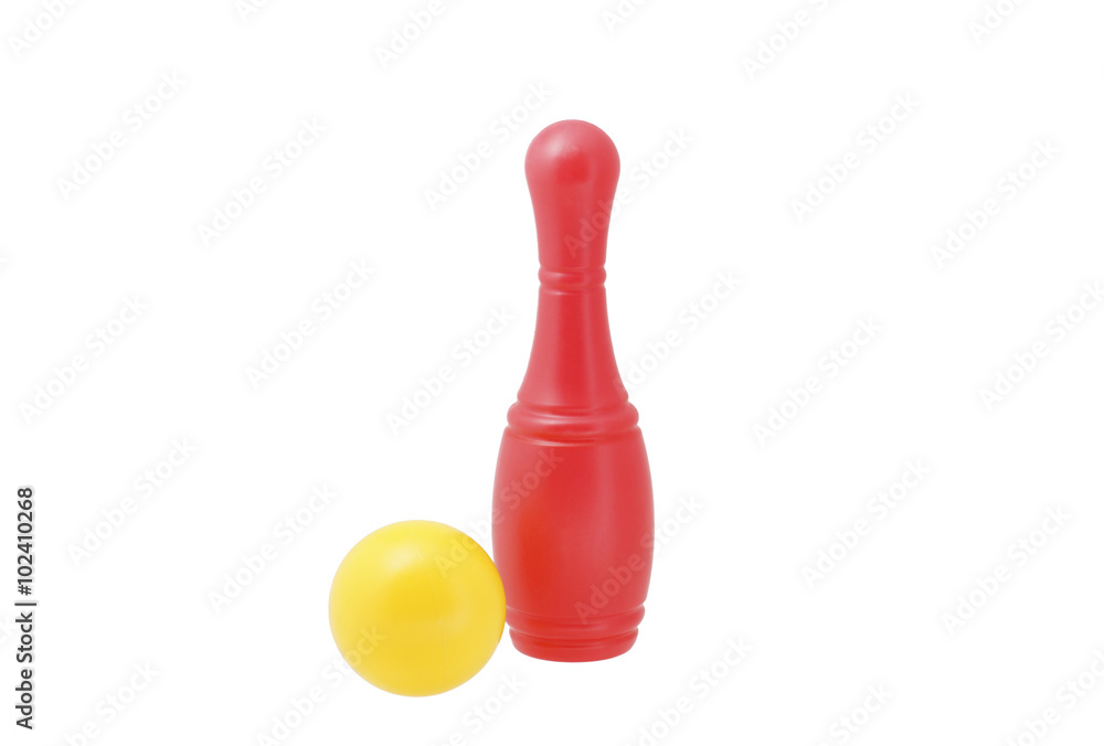 Red and yellow toy bowling ball. Isolated.
