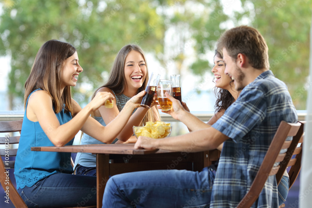 Group of happy friends toasting Stock Photo | Adobe Stock