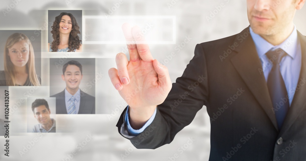 Composite image of businessman pointing these fingers at camera Composite image of businessman pointing these fingers at camera