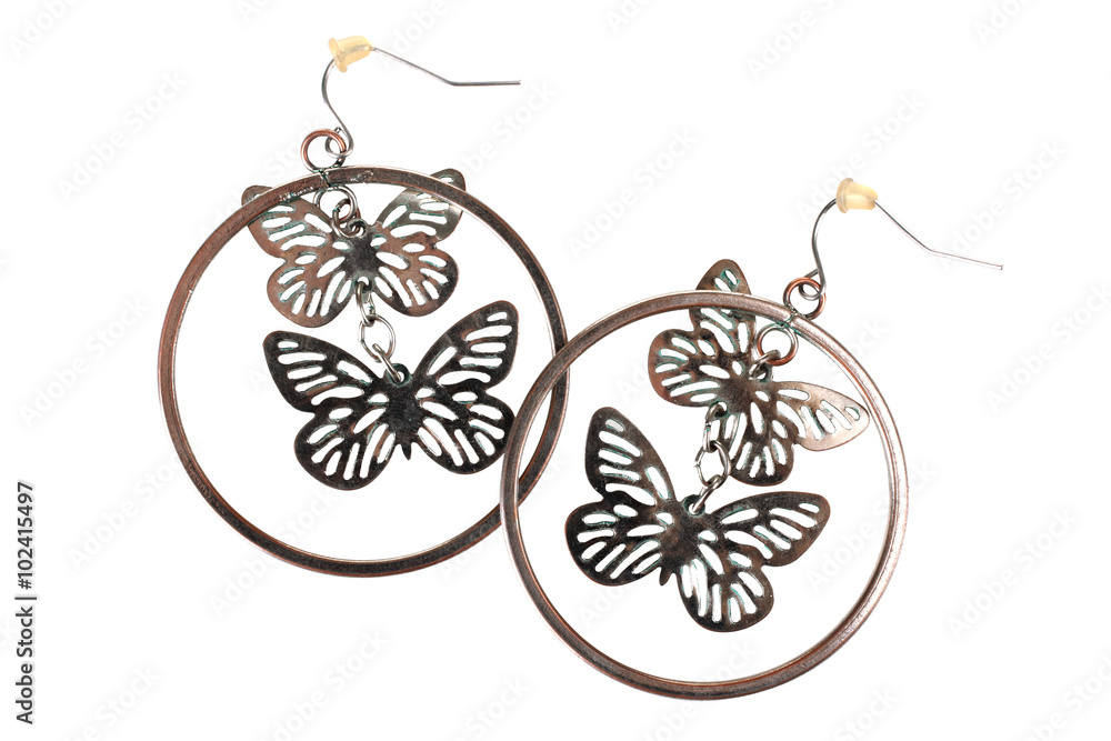 Fototapeta premium new beautiful women's earrings on a white isolated background