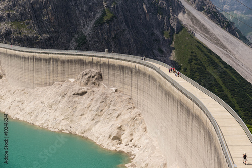 Summer Hiking Trip around a Lake in the Alps photo