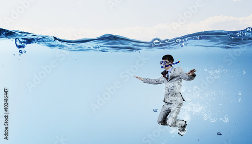 Diving in water businessman 