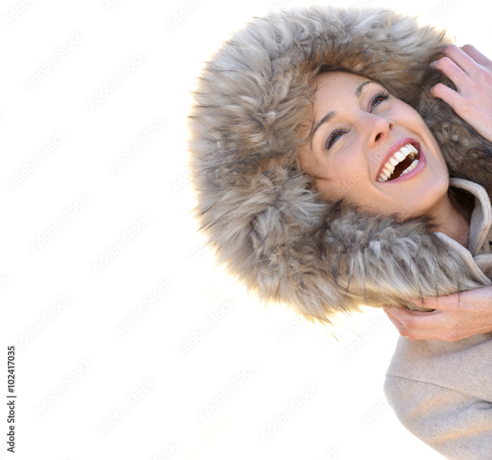 Portrait of cheerful girl with winter coat and fur hood Portrait of cheerful girl with winter coat and fur hood
