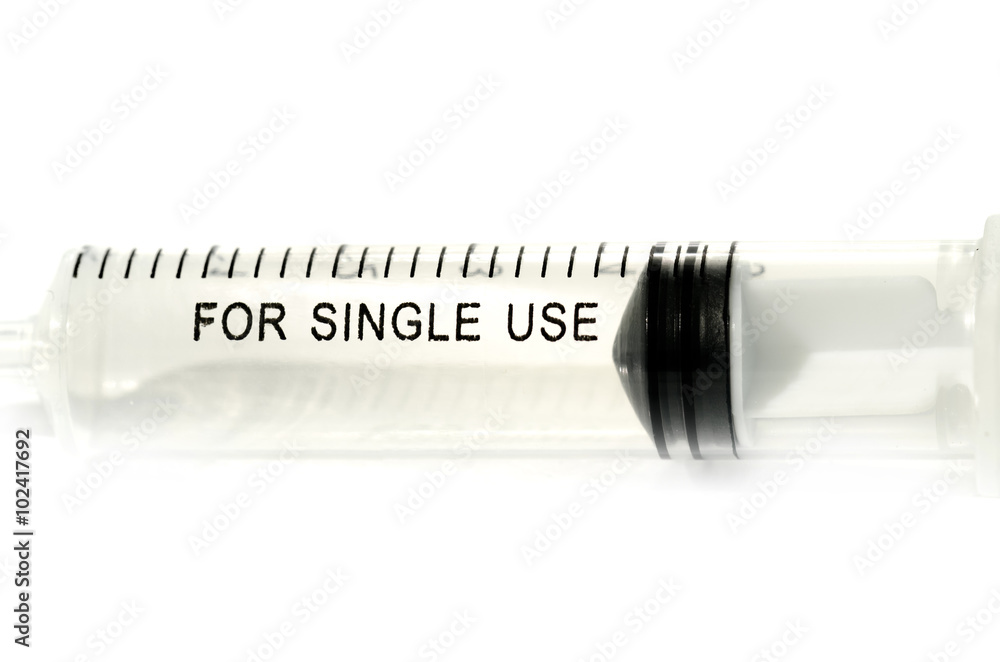 Medical sterile single use syringe graded isolated on white Medical sterile single use syringe graded isolated on white
