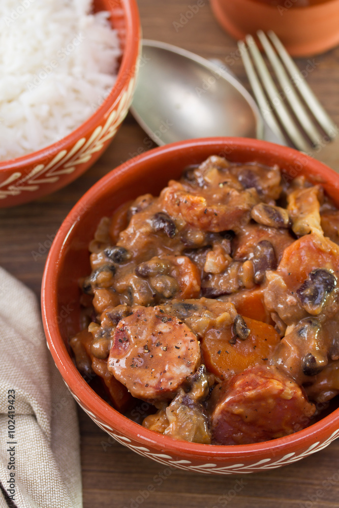 typical portuguese dish feijoada in ceramic brown bowl typical portuguese dish feijoada in ceramic brown bowl