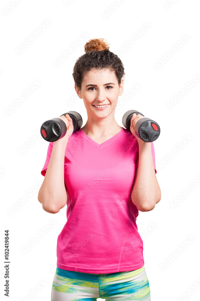 Female workout with dumbbells in the gym Female workout with dumbbells in the gym