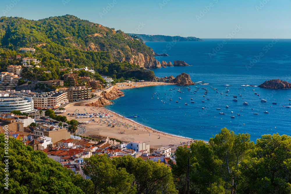 Aerial view of Gran Platja beach and Badia de Tossa bay in Tossa de Mar on the Costa Brava, Catalunya, Spain