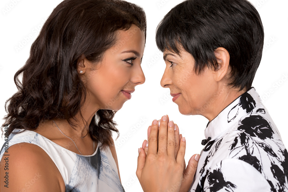 Portrait of happy mother and young daughter. Isolated Portrait of happy mother and young daughter. Isolated