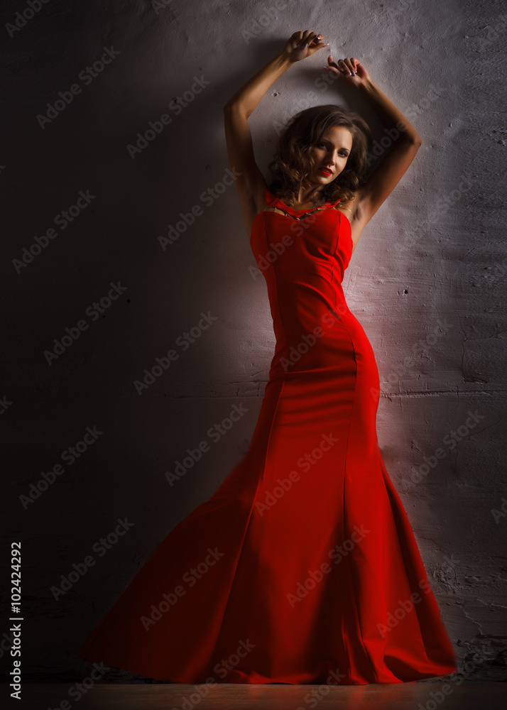 Portrait of Beautiful Sensual Woman in Fashion Red Dress. 