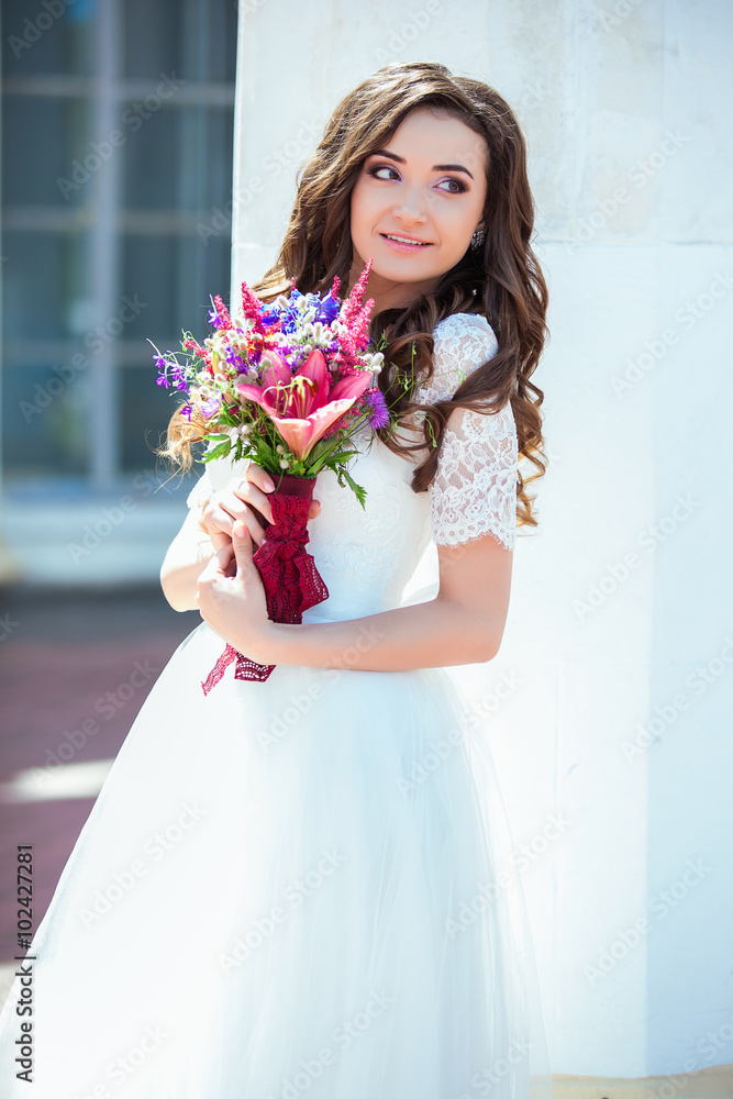 Closeup portrait of young girl with spring flowers Closeup portrait of young girl with spring flowers